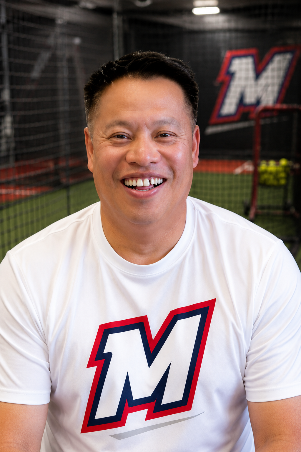 Coach Tien Ly inside the training facility